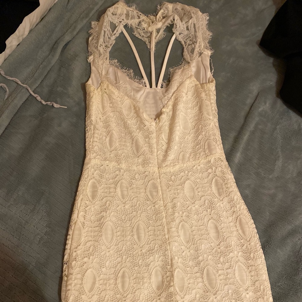 It’s a really pretty dress, not too short and the top part is very sexy!